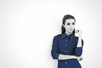 Young woman with color accent in fashion look on white background