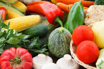 Background of fresh vegetables and greens closeup. Healthy eating.