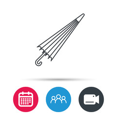 Umbrella icon. Water protection sign. Rainy weather symbol. Group of people, video cam and calendar icons. Vector