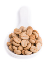 Un-roast arabica raw coffee beans close up