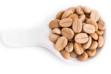 Un-roast arabica raw coffee beans close up