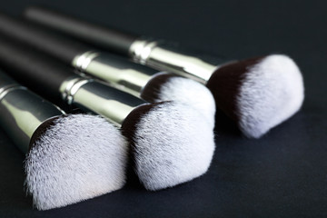 Brush with natural bristles for professional makeup, closeup, co