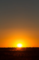 Fototapeta premium Sunset, silhouette, horizon, Namibia, Africa