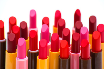 set of lipsticks red color on white background