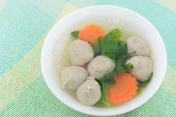 vegetable soup with meat ball on fabric cotton background