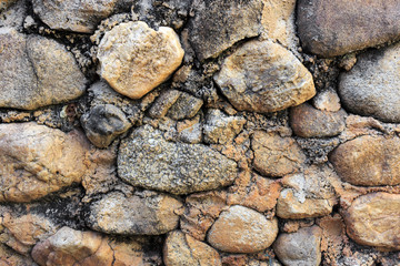 Stone wall background. over light