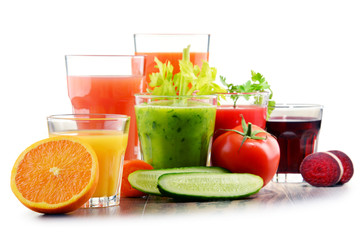 Glasses with fresh organic vegetable and fruit juices