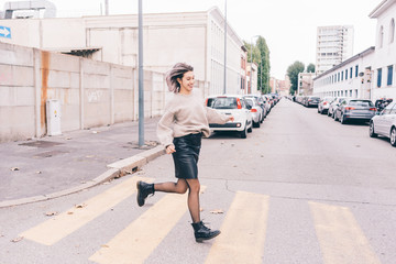 Young beautiful purple grey hair caucasian woman walking outdoor in the city, having fun - happiness, carefree, freedom concept
