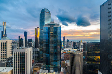 Melbourne City during a radiant sunset, looking south over southbank and the bay