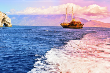 Obraz premium sailing boat on the water surface of sea