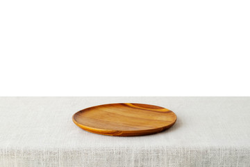 Empty wooden tray on sack tablecloth isolated on white backgroun
