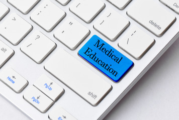 Business concept: Medical Education on computer keyboard backgro