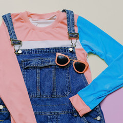 Fashionable denim overalls and accessories. Stylish clothes. Eye