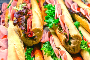 Sandwiches with vegetables and ham sold in fast food restaurant