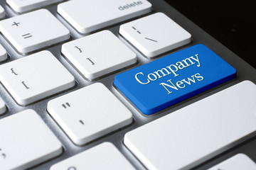 Company News on white keyboard