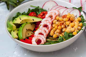 Healthy green salad with avocado and shrimp. Love for a healthy food concept