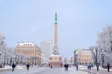 Winter landscape monument of freedom in cold and snowy day