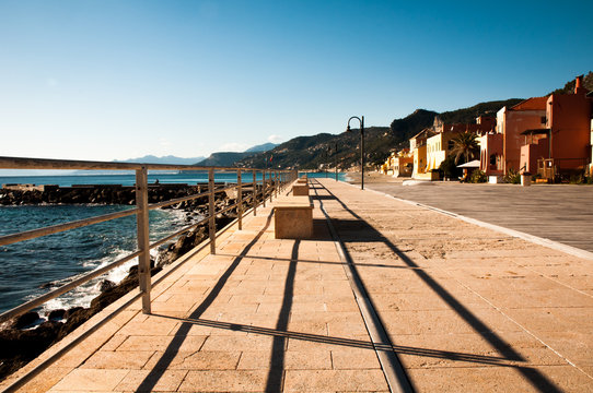 view of varigotti bay in italy with its beach and houses