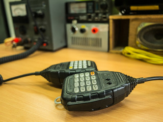 radio communication for talking microphone on wood background