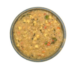 White bean soup in a bowl on a white background.