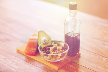 close up of food and olive oil bottle on table