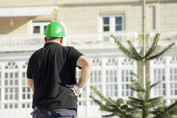 painter man working  to repairing and painting the wooden house © GDM photo and video