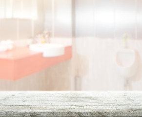 Obraz na płótnie Canvas Table Top And Blur Bathroom of Background