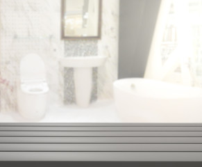 Table Top And Blur Bathroom of Background
