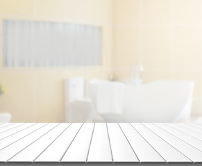 Fototapeta na wymiar Table Top And Blur Bathroom of Background
