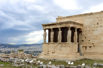 Fototapeta premium caryatids against dramatic sky, Athens