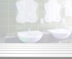 Obraz na płótnie Canvas Table Top And Blur Bathroom Of Background