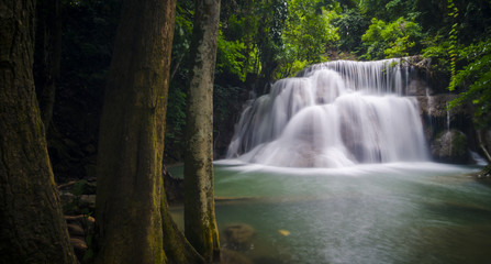 Fototapeta na wymiar Huay Mae Kamin Waterfall, beautiful waterfall in autumn forest, Kanchanaburi province, Thailand