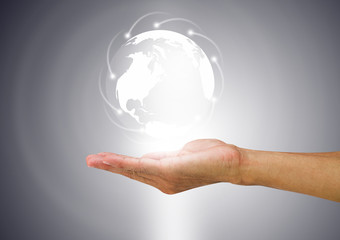 Globe with worldwide connection communication on man's hand, technology communication concept