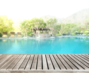Wood Table Top Of Background And Pool