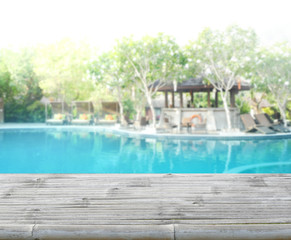 Wood Table Top Of Background And Pool