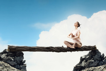 Girl practicing yoga . Mixed media