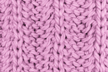 Knitted fabric textured background.