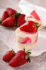 Cake with white chocolate, cream and strawberry