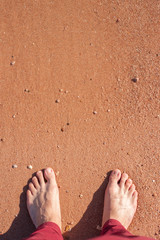 barefoot on sand