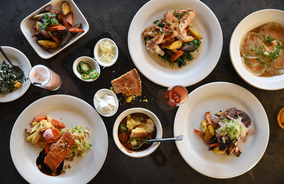 Variety of freshly prepared dishes on table, overhead view