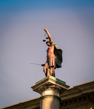 statue of scales of justice