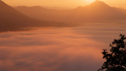 Sunrise, mountain and fog landscape with warm tone, for graphic