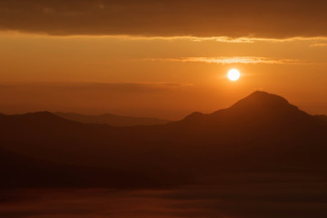 Sunrise, mountain and fog landscape with warm tone, for graphic