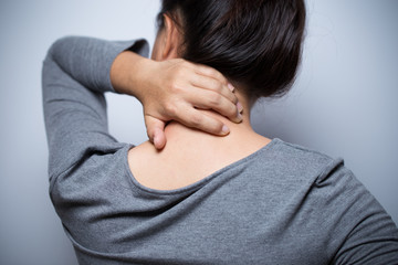 Woman has neck pain