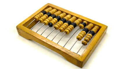 Old wooden abacus on a light background