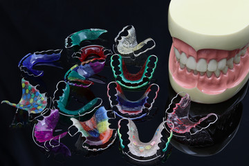 Many retainer on black screen