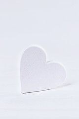 Happy Valentine's Day. White heart on a white background