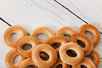 Tasty baked cookies on old wooden background.