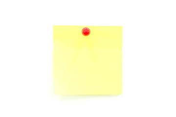Yellow sticky notes with push pin on white