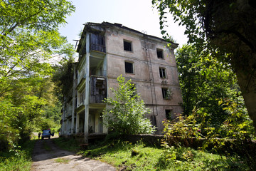 Abandoned mining ghost-town Polyana, Abkhazia. Destroyed empty houses 